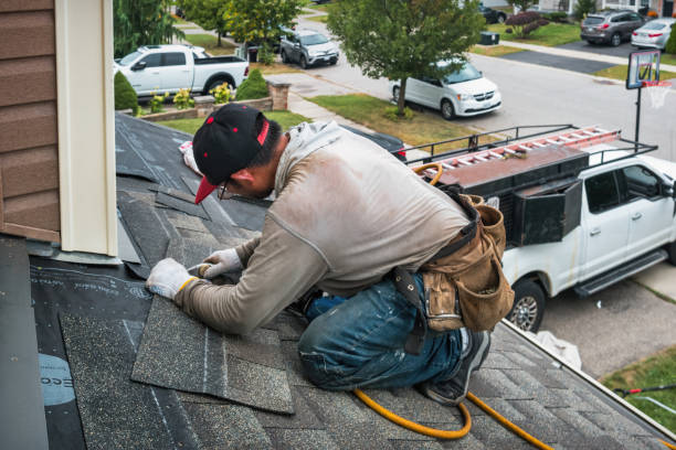 Professional Roofing technician working in Bay Shore, NY